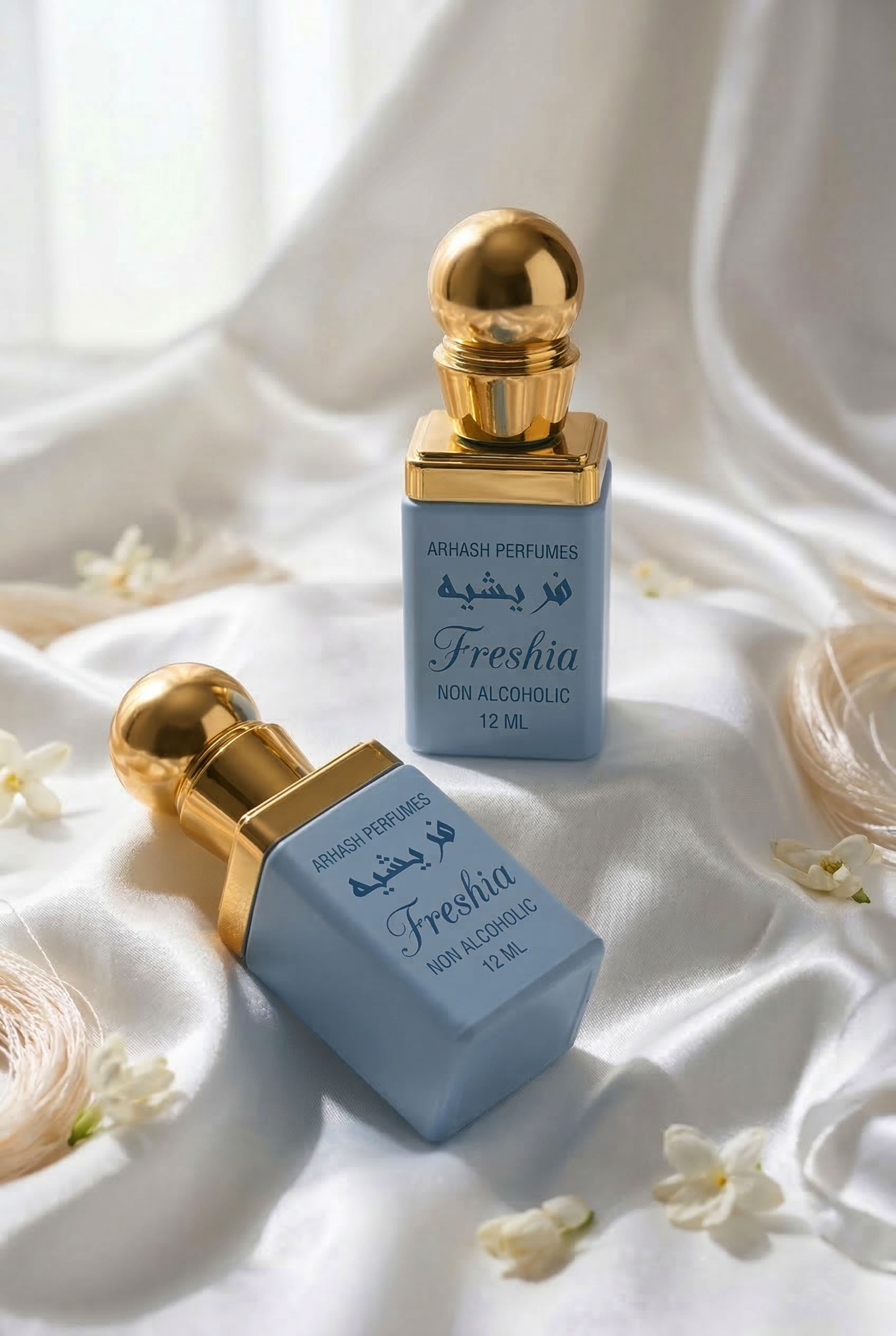 alt="Freshia 12ml Non-Alcoholic Cooling Attar - Refreshing summer floral fragrance by Arhash"